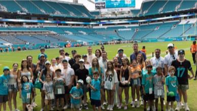 Postgame group photo on the field